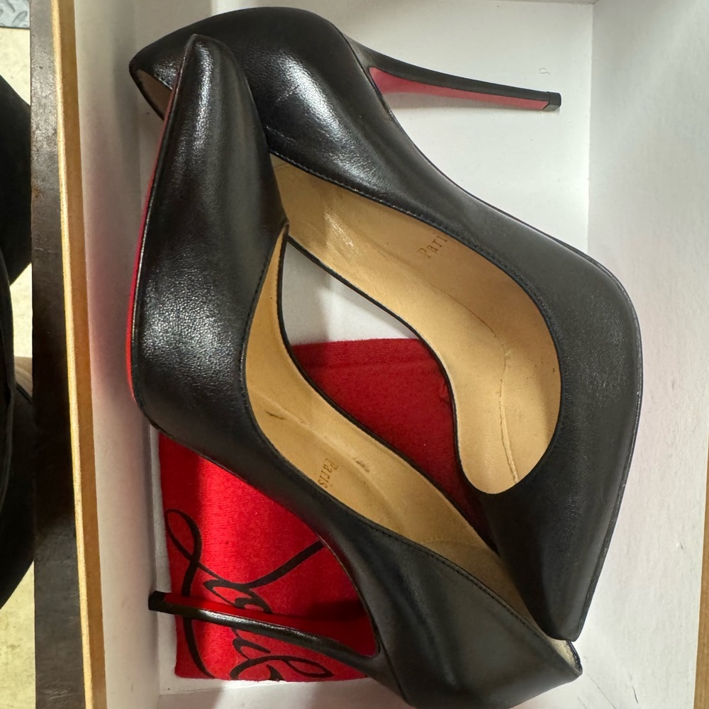 Chic Black Leather Heels with Red Sole